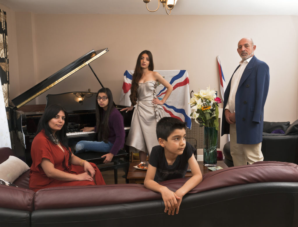 New British. Iraqi/Syrian David family living in Wembly, London. Fater, Samir David, mother Nahrin, son, Nishra'd' Atour, daughter at piano, Ninweh and daughter Noora.