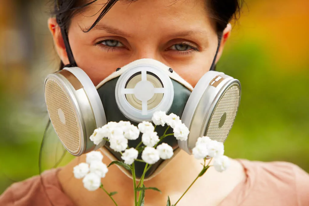 LadyInFilterMaskandFlower-2